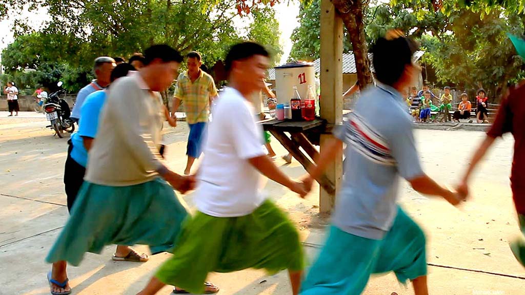 Men dancing in the Lisu New Year Celebration.